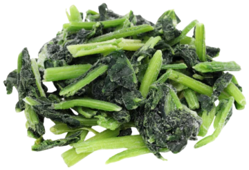 Frozen chopped spinach with bright green stems and dark leafy pieces, ideal for commercial food service and wholesale distribution.